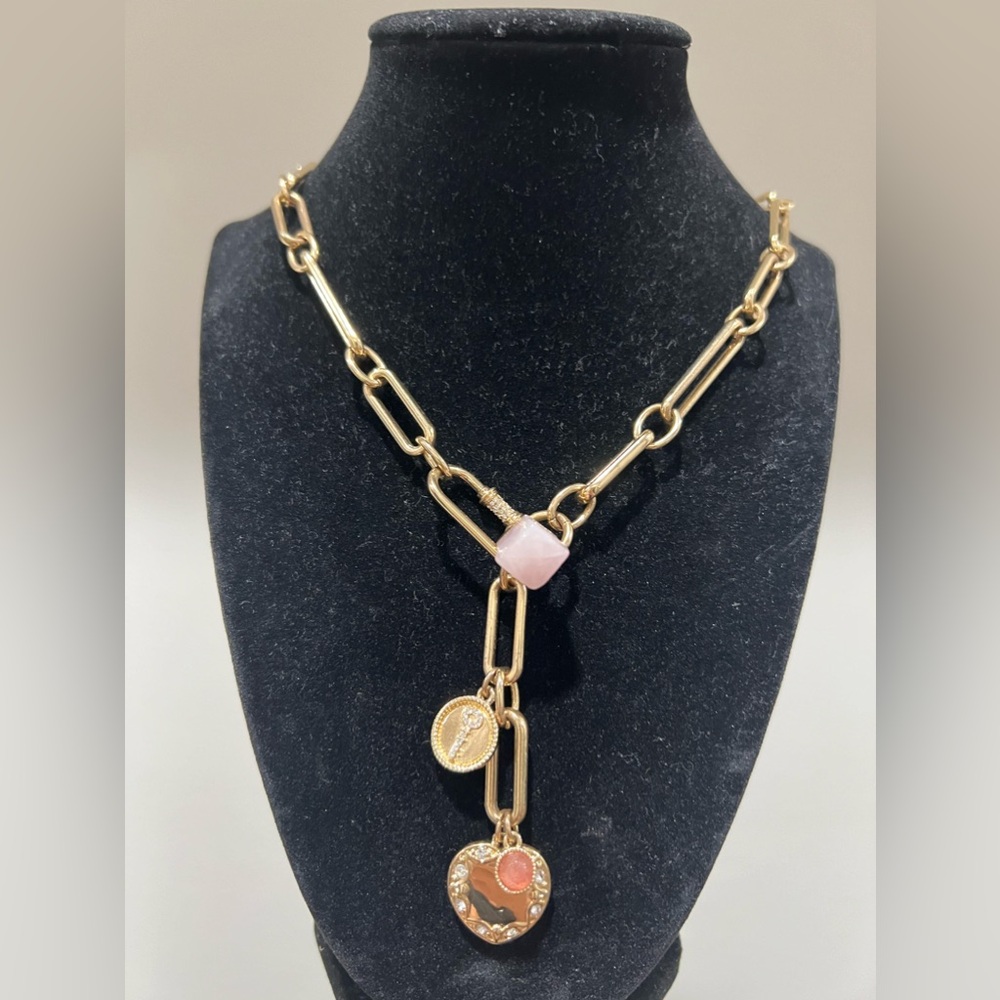 WHBM Gold necklace gold tone with pi details.